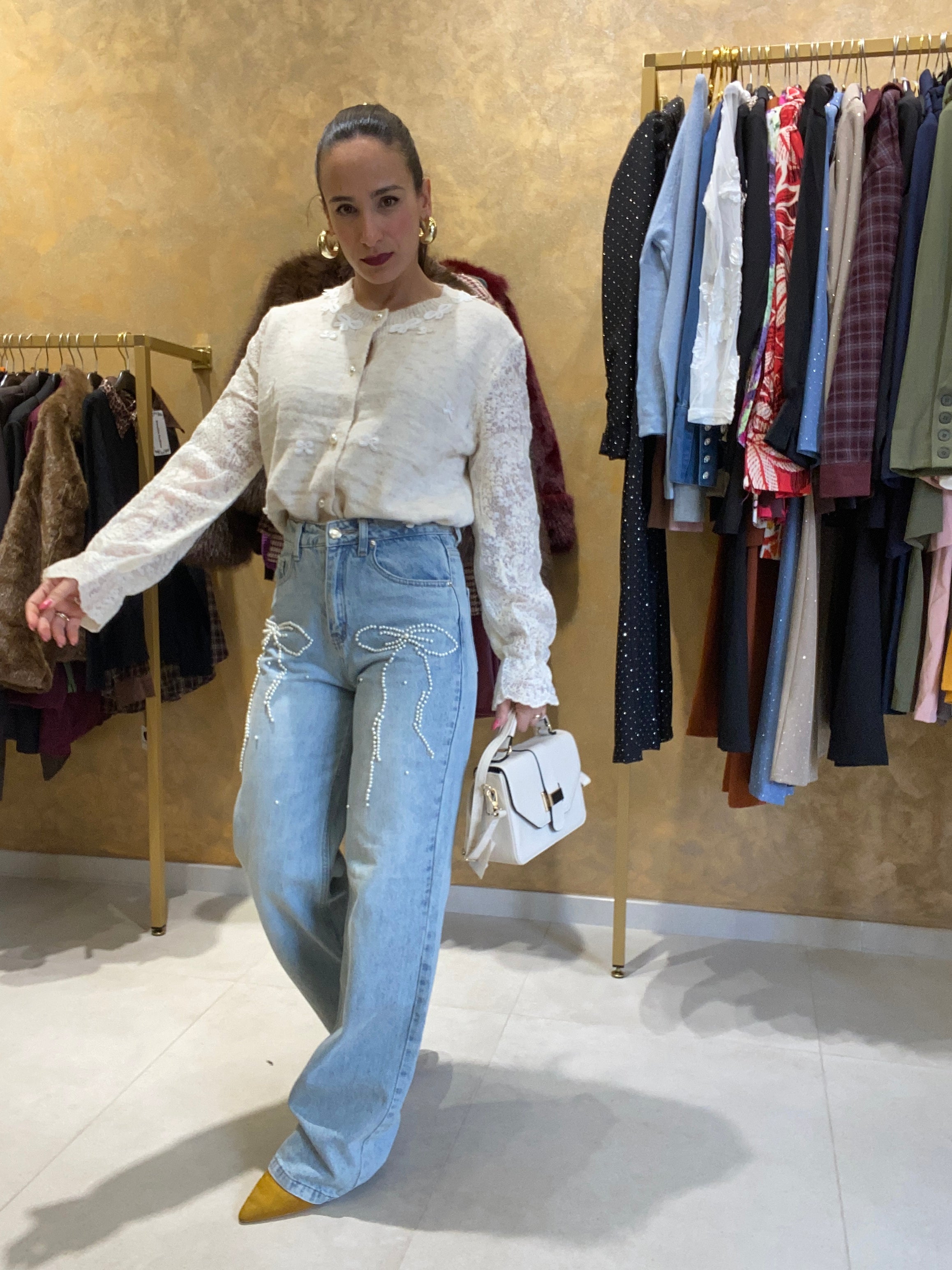 Jeans fiocchi con perle