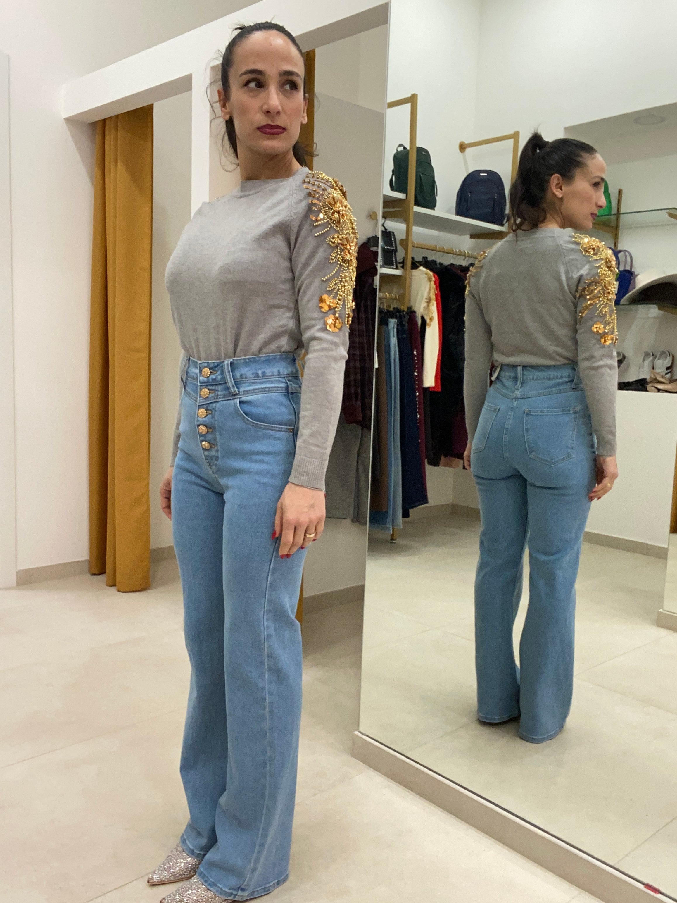 Jeans bottoni oro