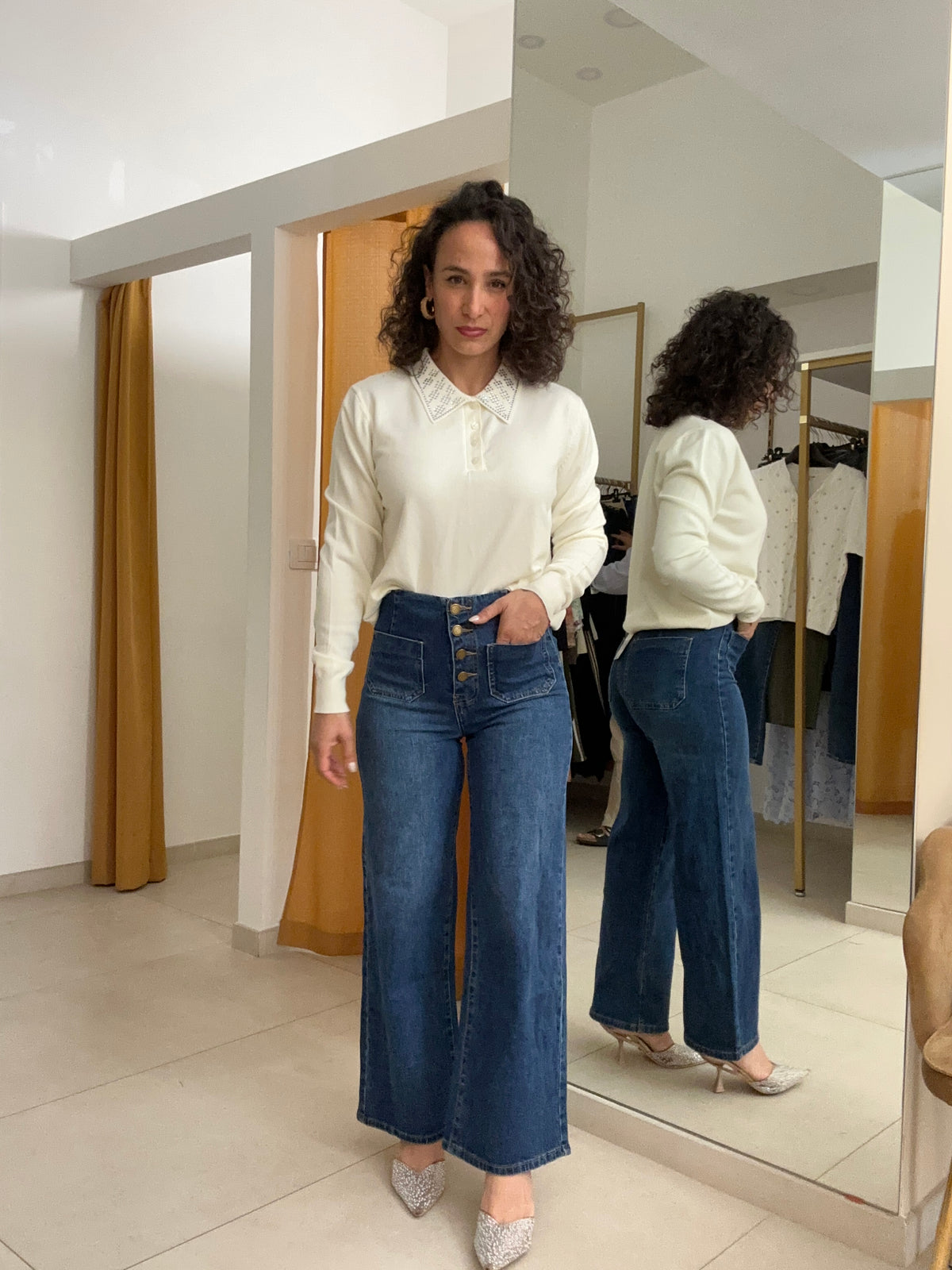 Jeans bottoni vita alta