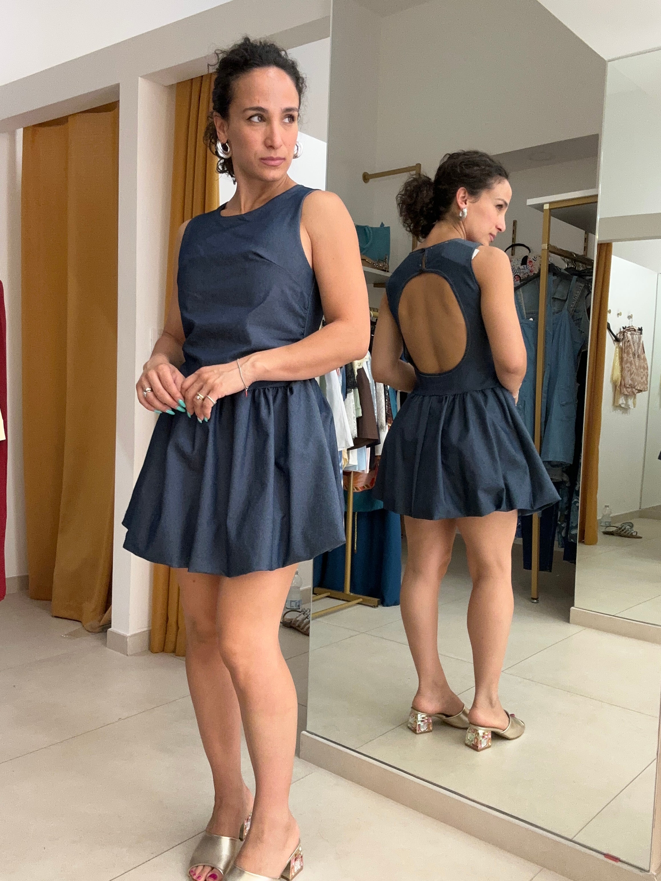 Abito scollatura posteriore
