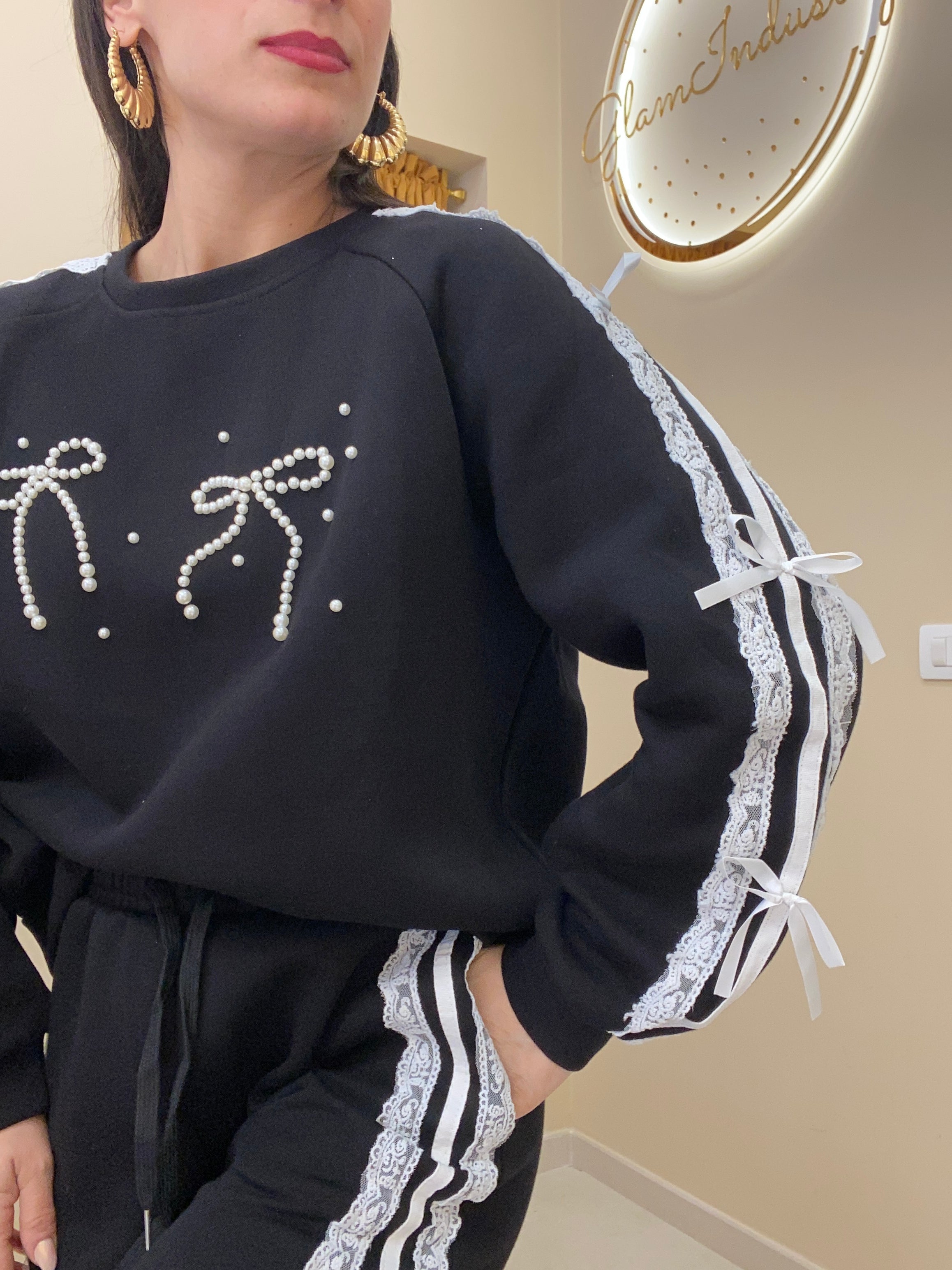 Tuta doppio fiocco con perle