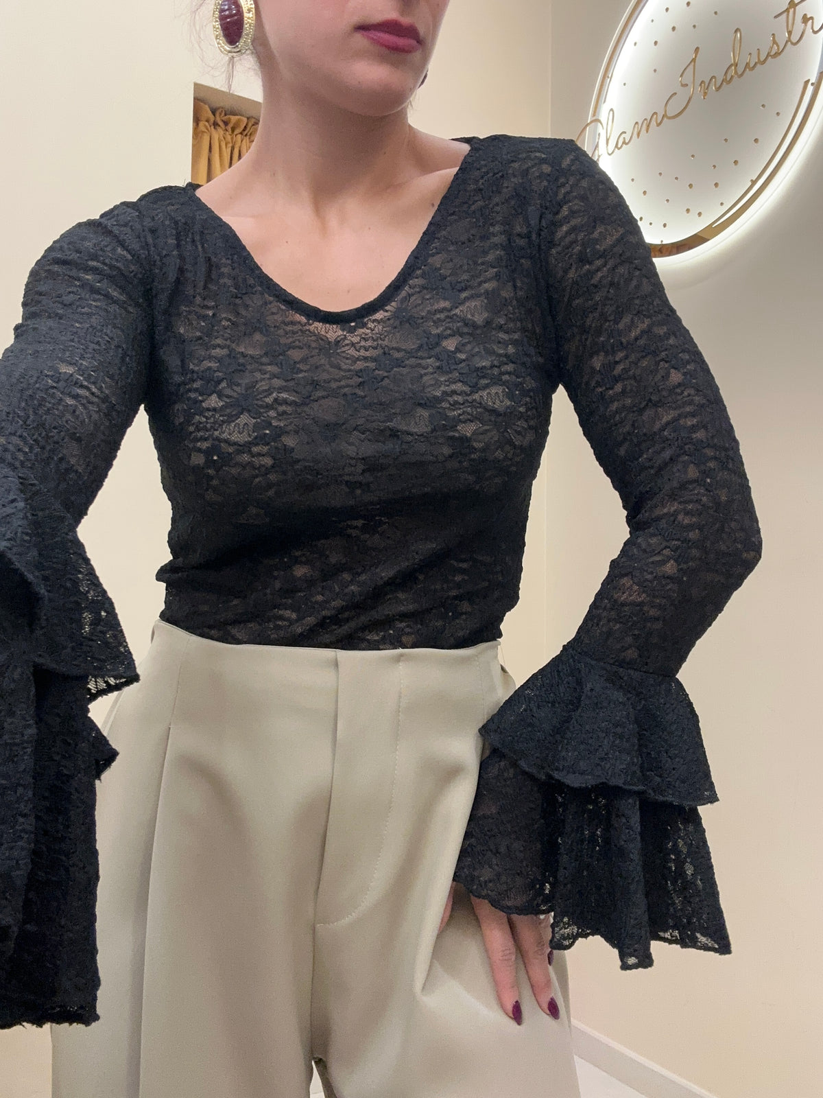 Blusa merletto con manica ampia