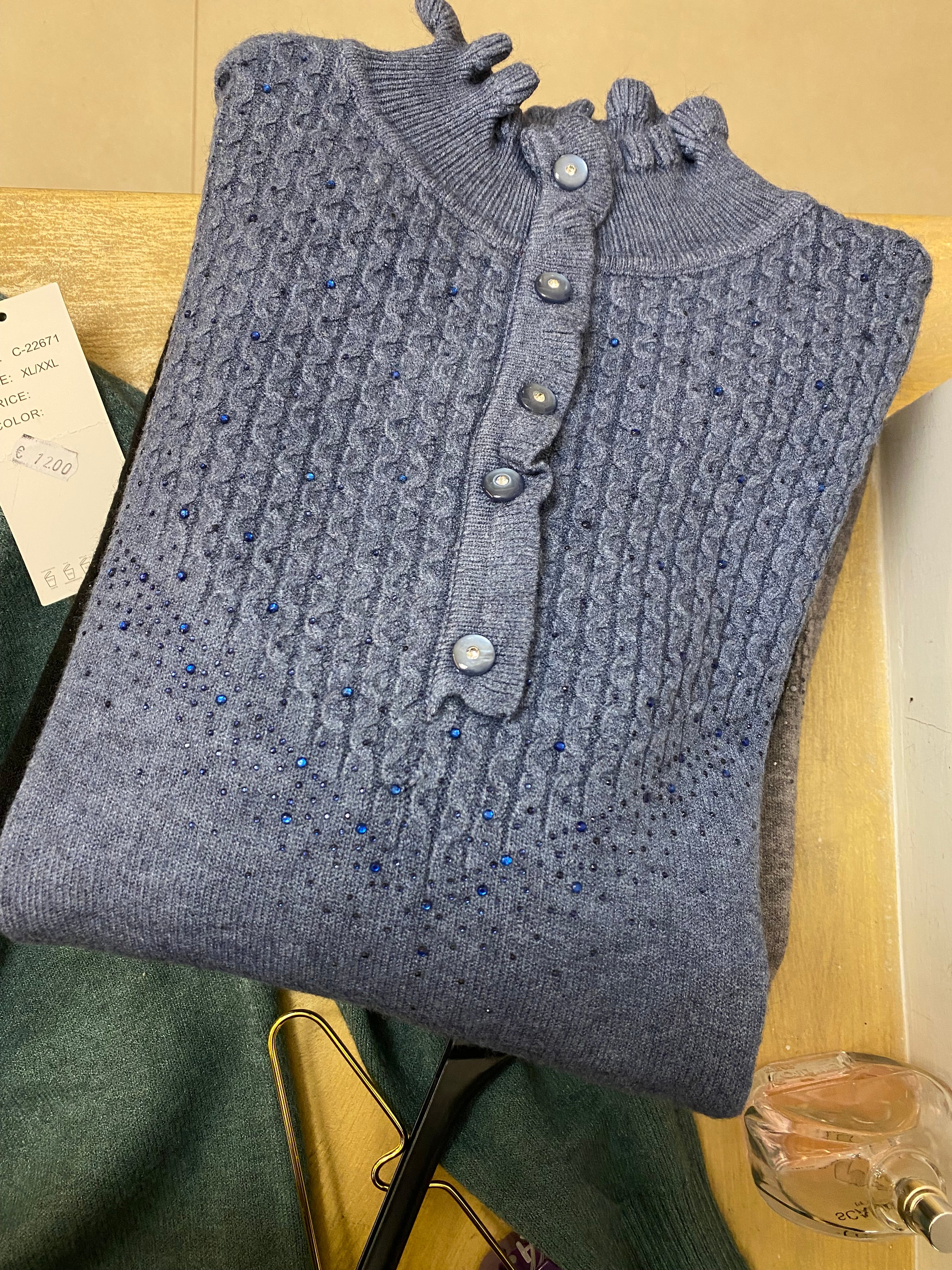 Maglione collo alto particolare