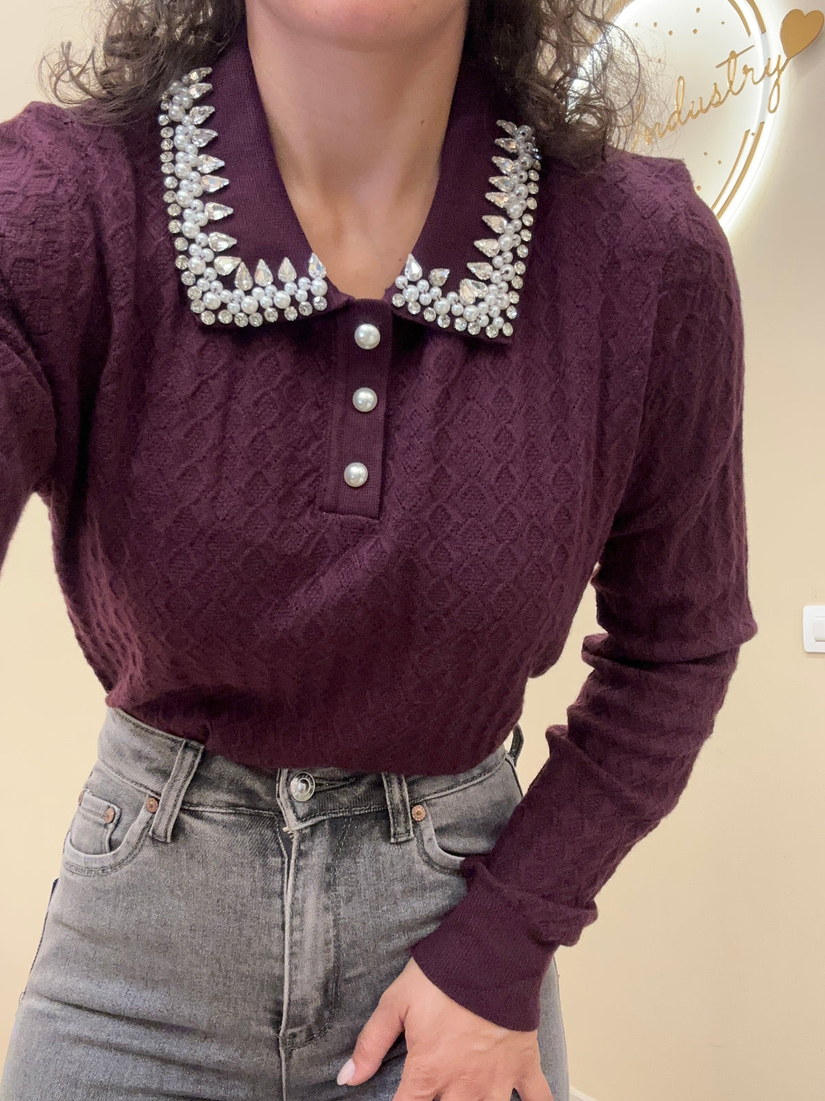 Polo con maxi applicazioni