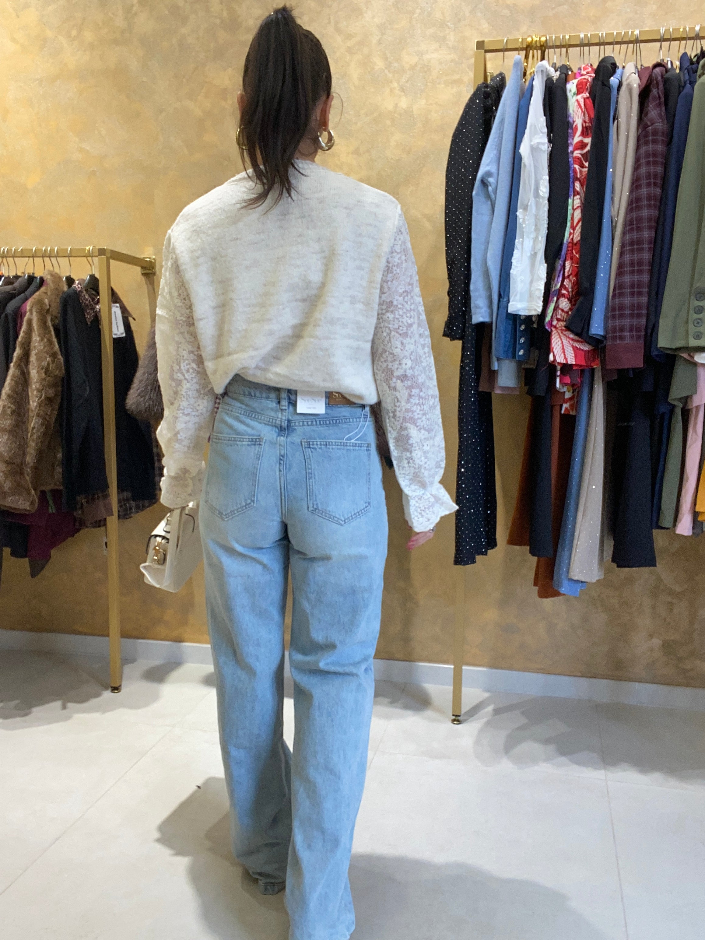 Jeans fiocchi con perle