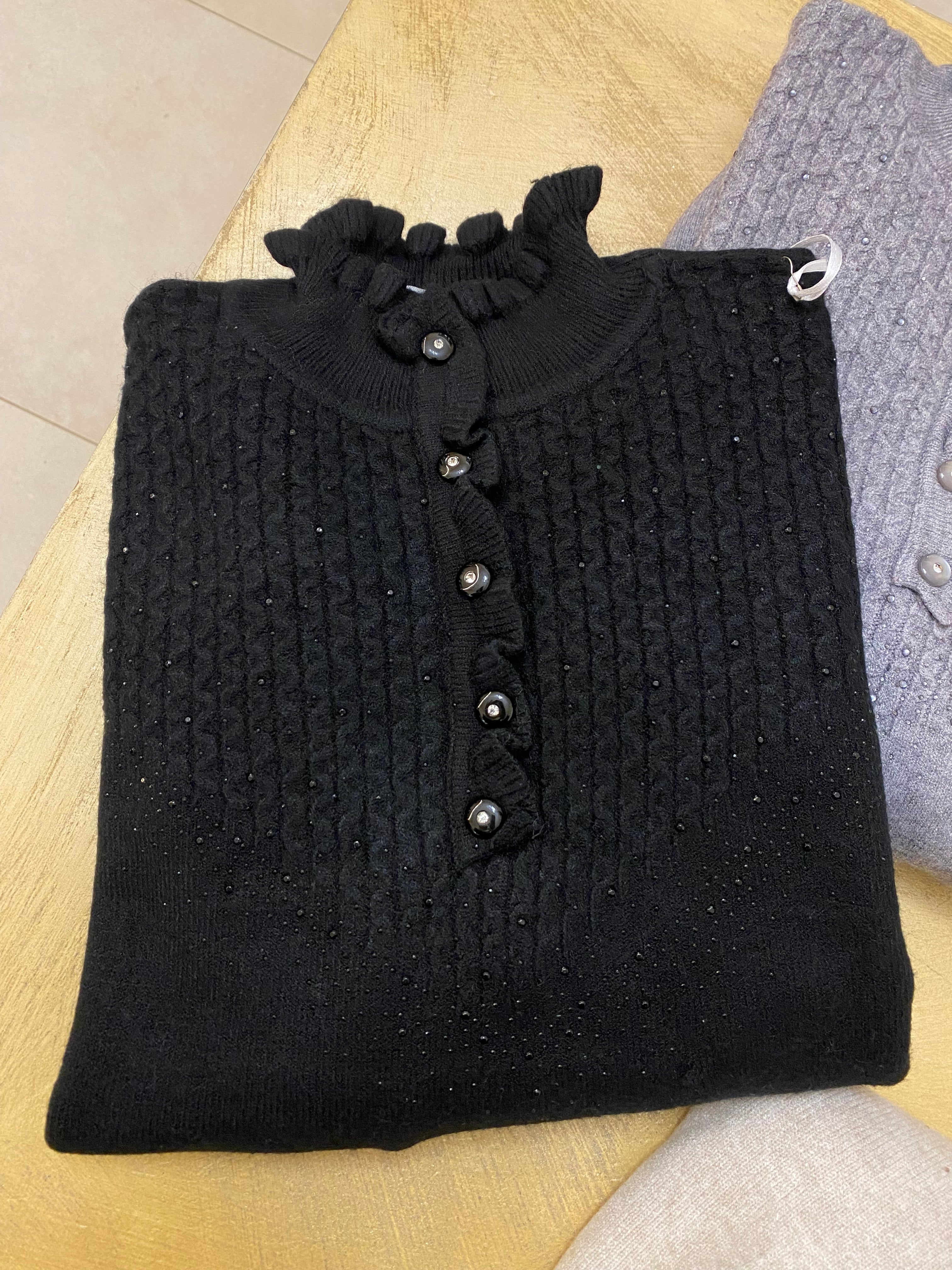 Maglione collo alto particolare