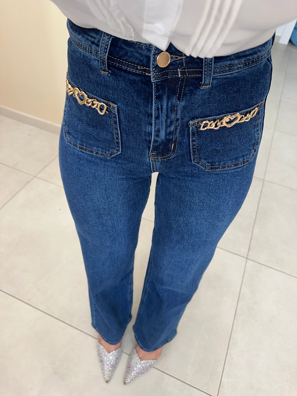 Jeans con applicazioni cuore