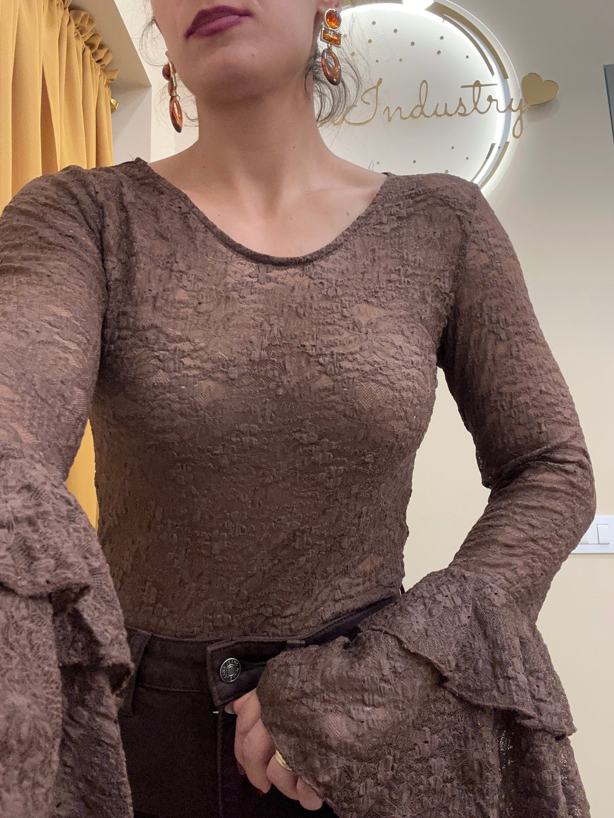 Blusa merletto con manica ampia