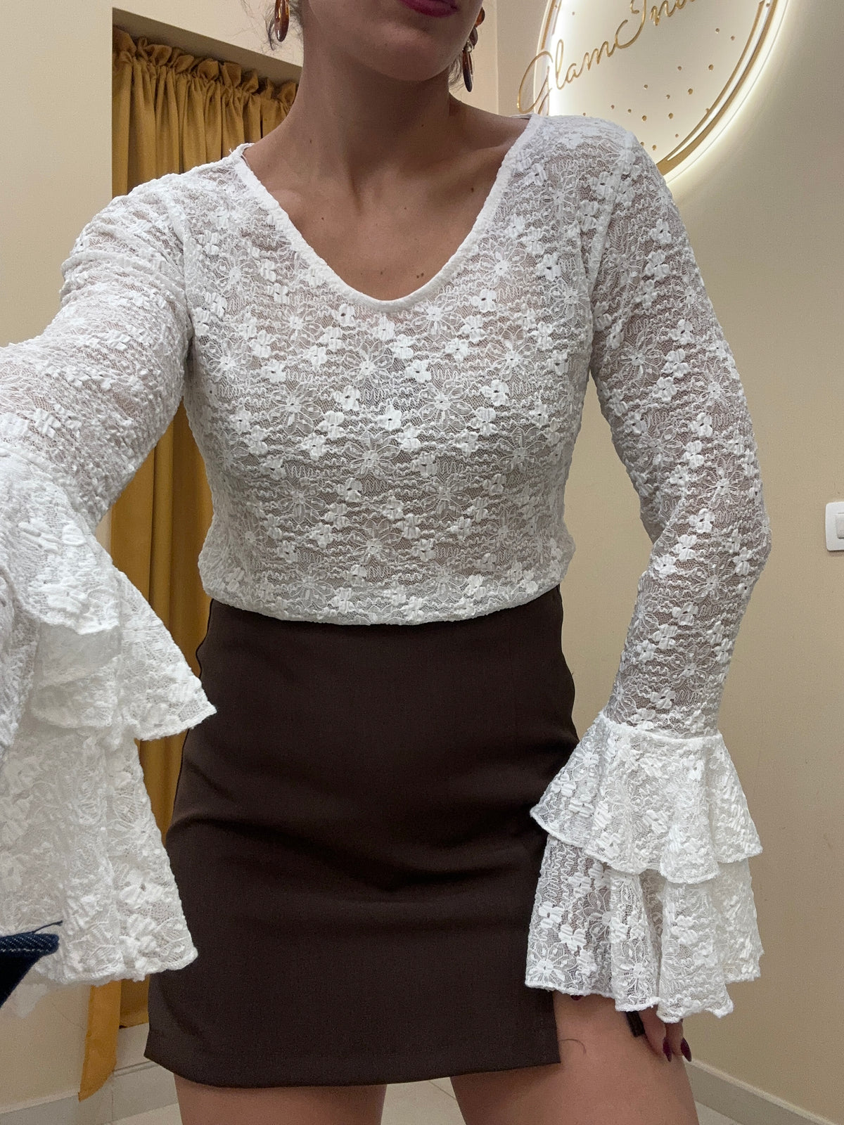Blusa merletto con manica ampia