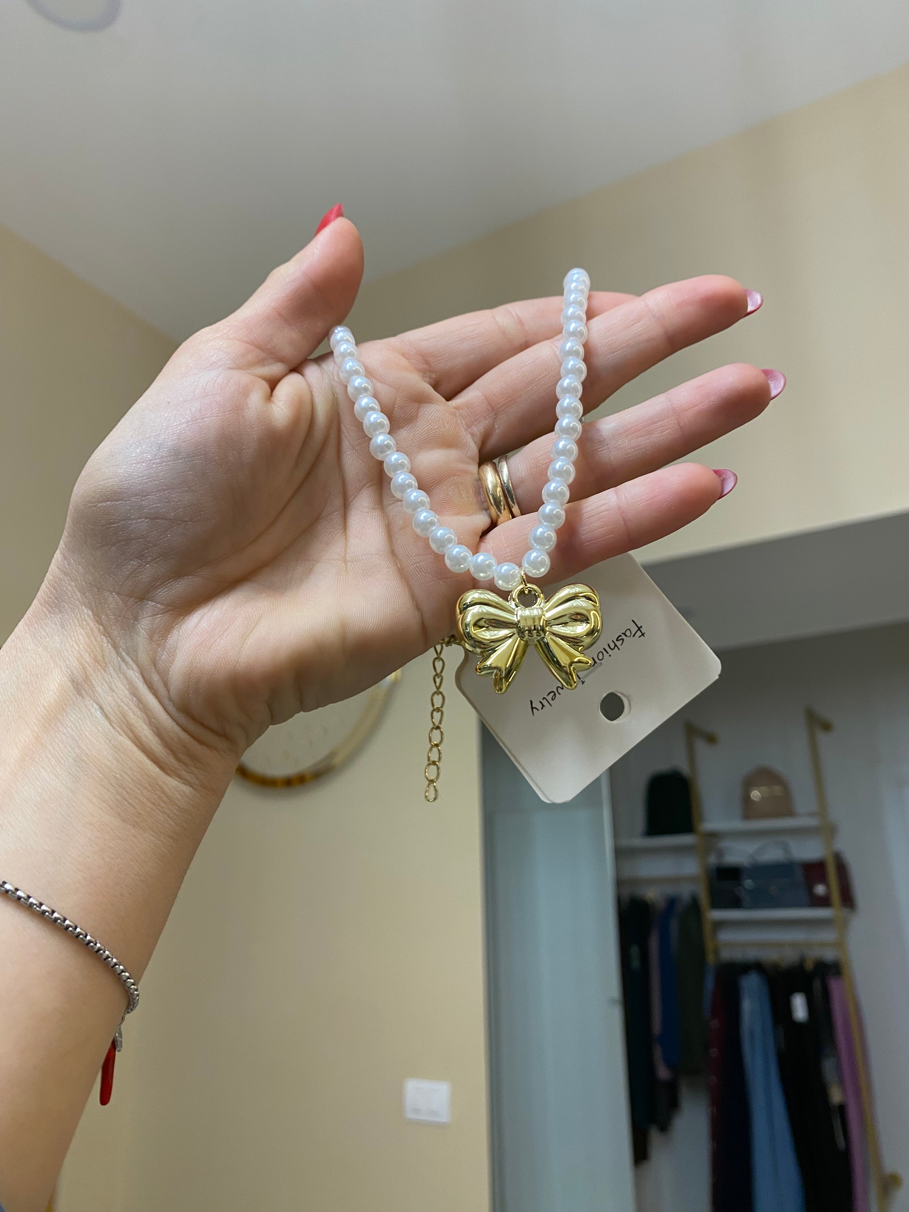 Collana perle con fiocco