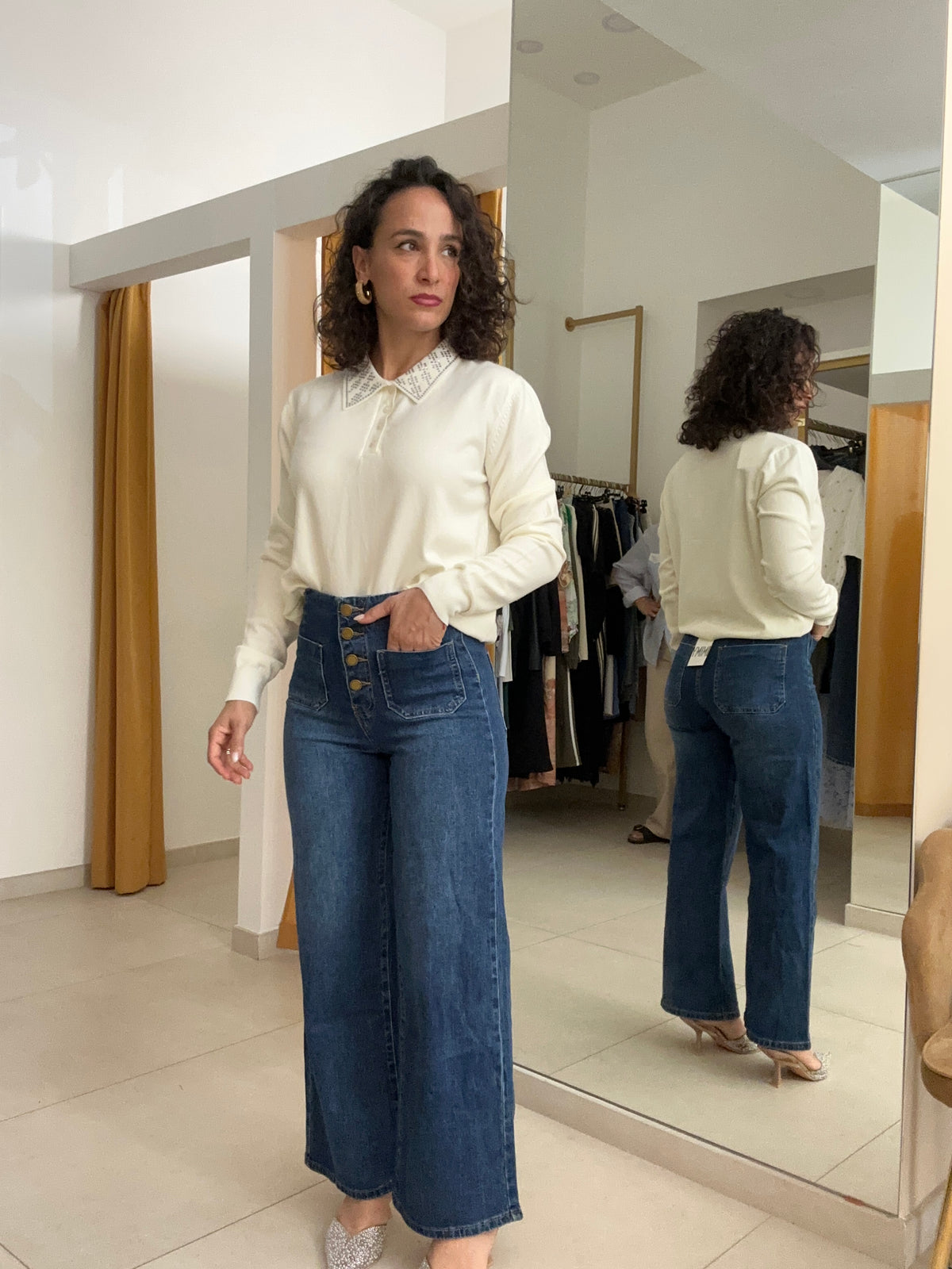 Jeans bottoni vita alta